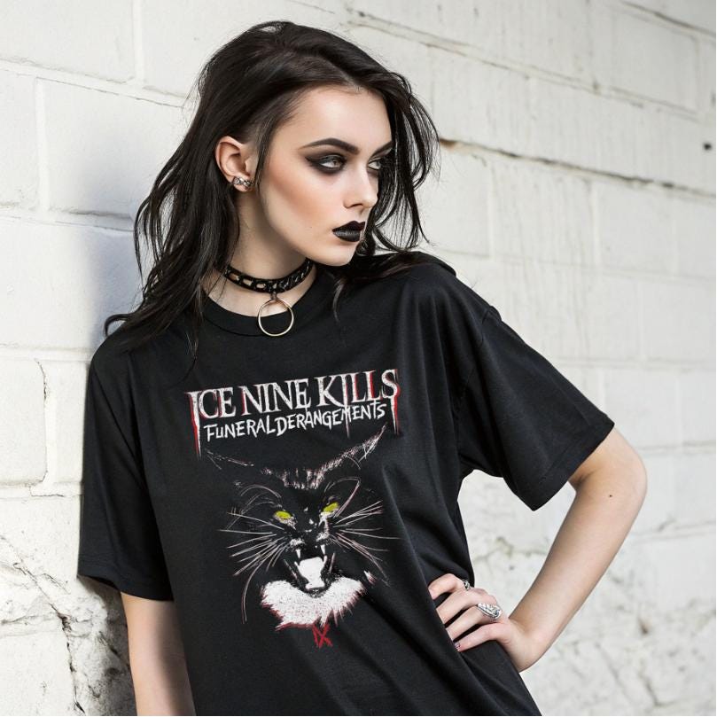 Show off your love for iconic rock/metal music with this striking album-inspired t-shirt. The detailed graphic design brings bold, artistic energy to your wardrobe. Perfect for music enthusiasts who appreciate album artwork and unique band-inspired fashion! 🎸🔥 #RockTee #MetalTShirt #AlbumArt #MusicMerch